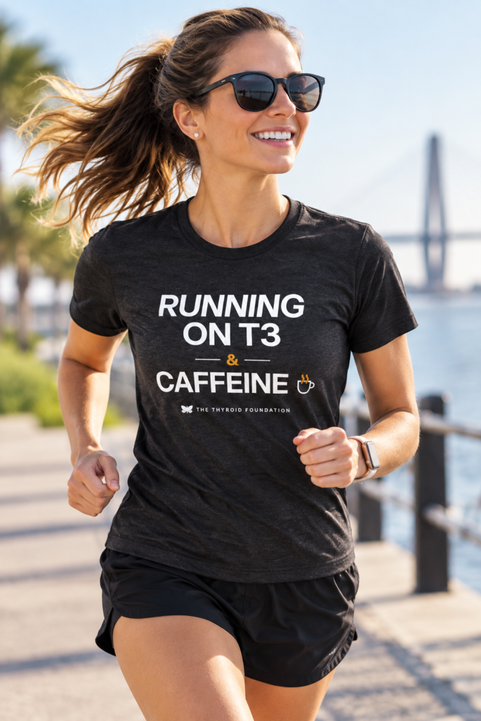 Runner wearing the Running on T3 and Caffeine tee along the Charleston waterfront